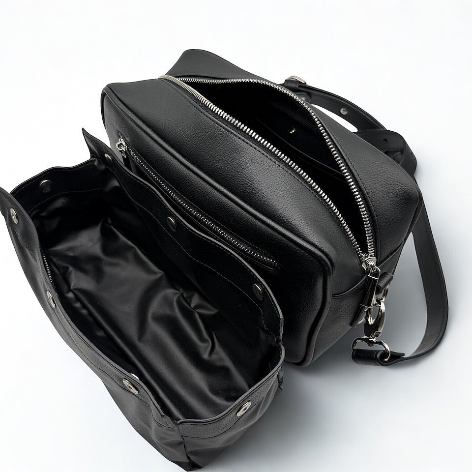 HILOWIND Gassitasche aus hochwertigem veganem Leder mit herausnehmbaren Innenfach in schwarz.